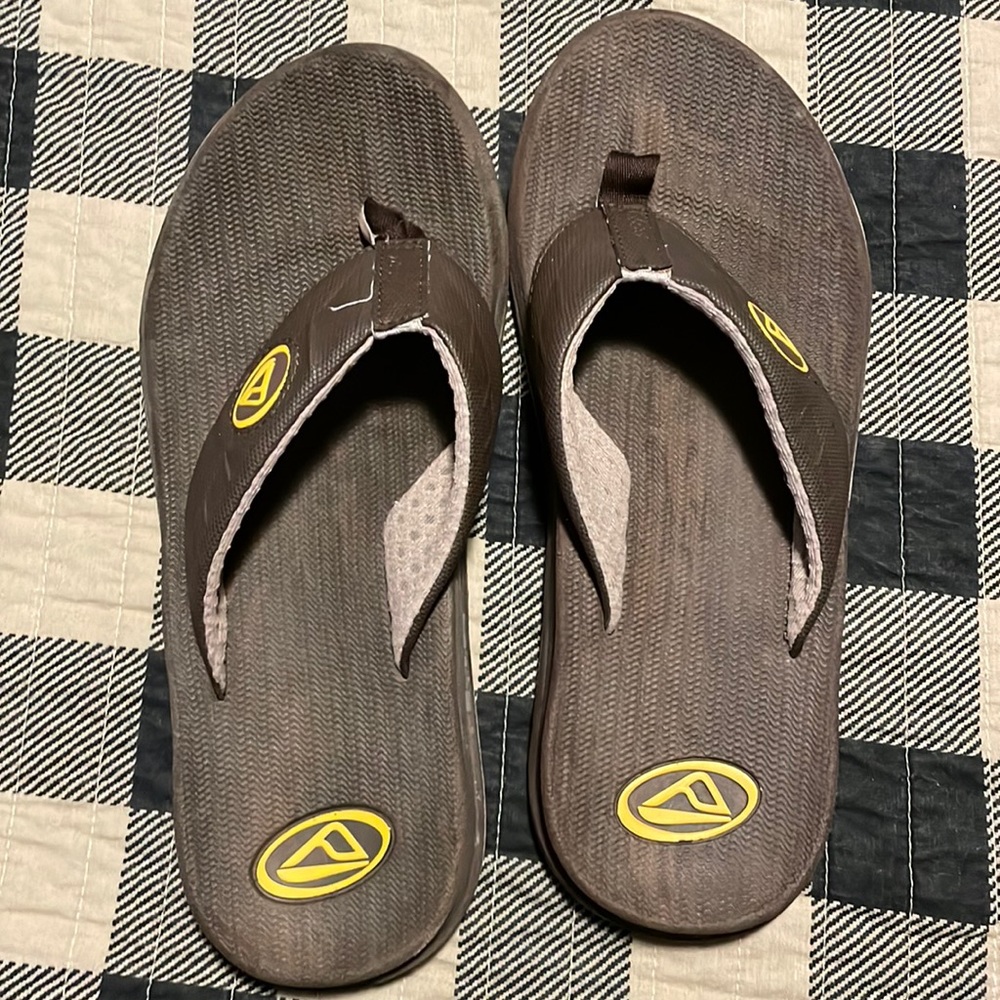 Reef, brown flip flops. Still a lot of wear left on them!